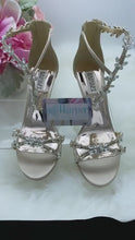 Load and play video in Gallery viewer, Badgley Mischka Feather Crystal Wedge Sandals
